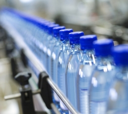 Close up on bottles in a bottle industry ** Note: Shallow depth of field